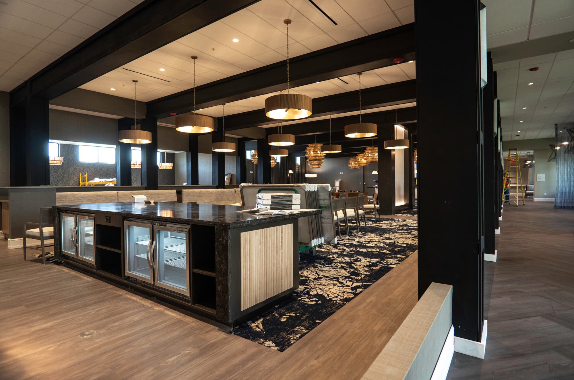 Upscale finished common-area interior with feature lighting
